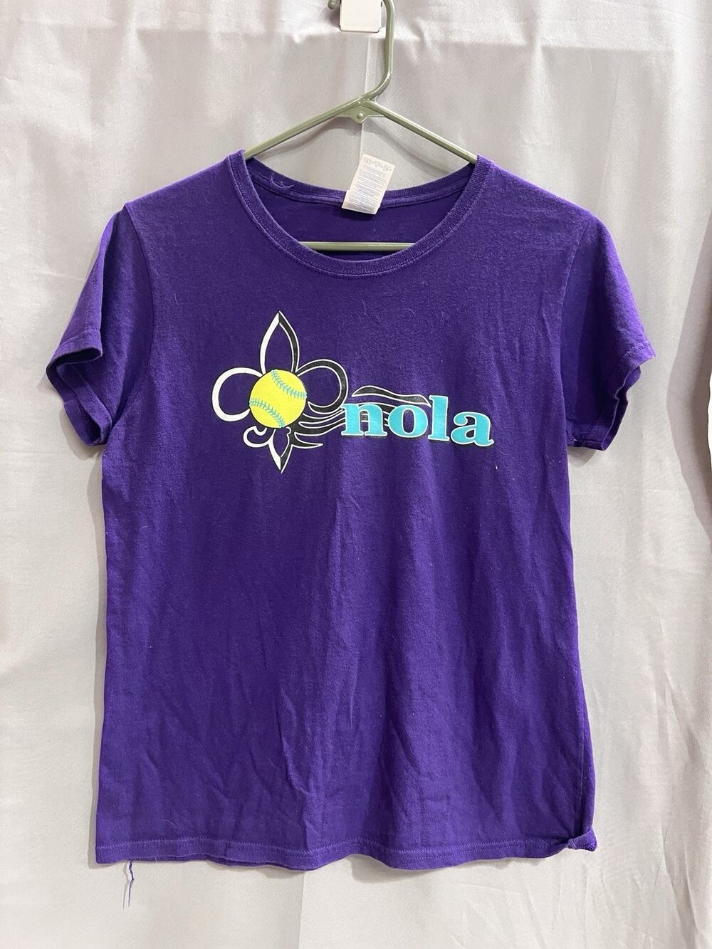 purple T-shirt features a softball-themed fleur-de-lis logo Size M TG2120 Sport